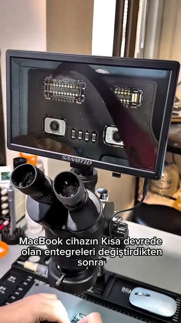 Nobil Bilişim atölyesinde mikroskop altında MacBook anakartında entegre değişimi